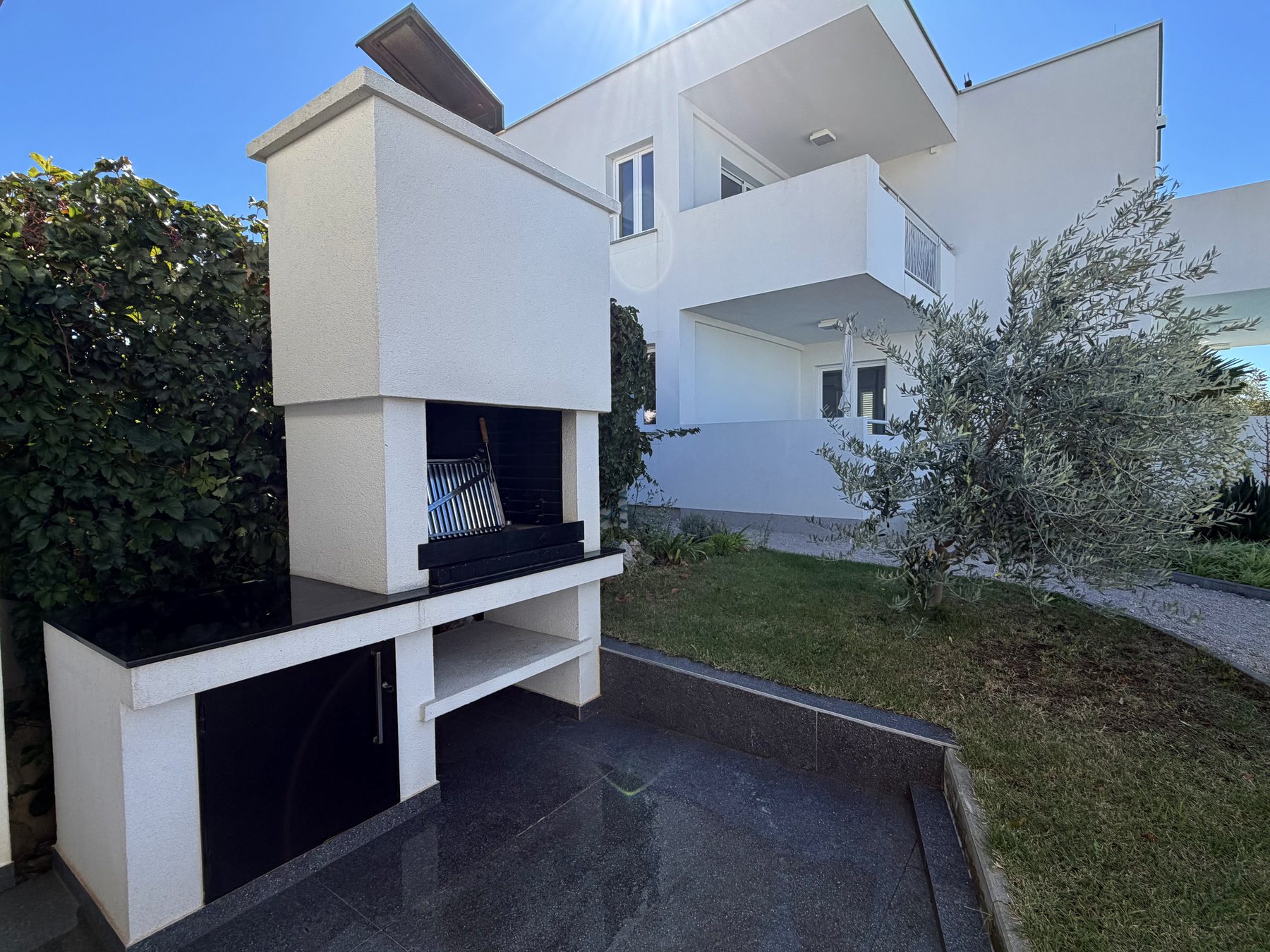 Built-in barbecue in the outdoor area of the house