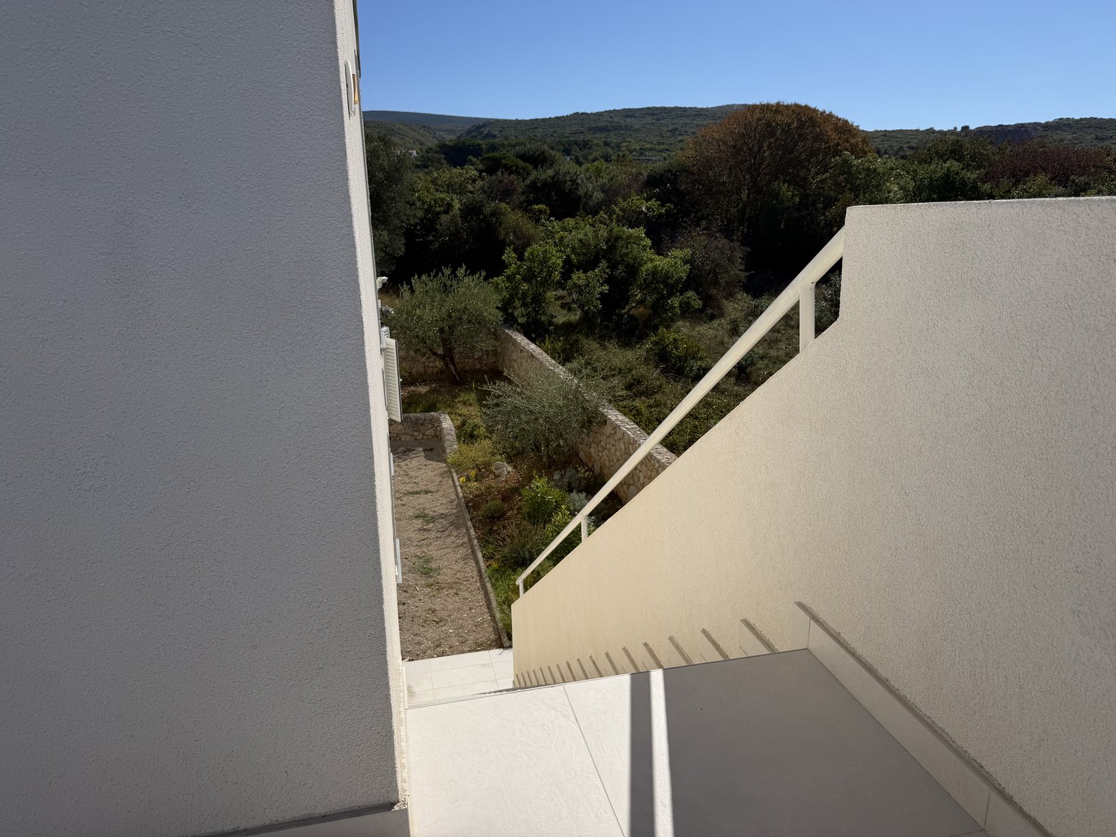 Outdoor stairway leading to the garden